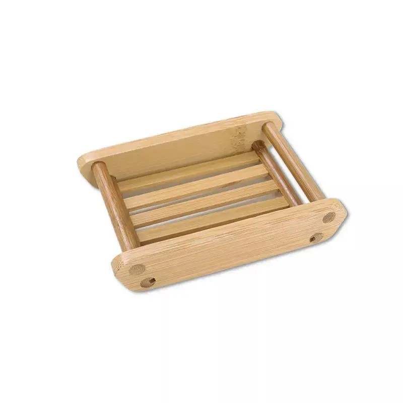 A natural bamboo soap dish with multiple slats, approximately 4.25 inches by 3 inches.