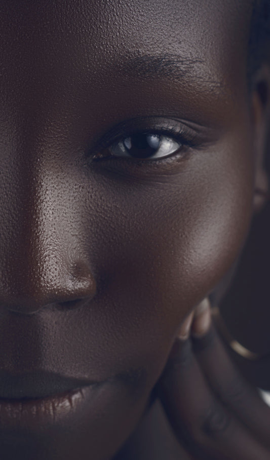 Photo by Heyy  Kazz: https://www.pexels.com/photo/close-up-artistic-portrait-of-an-african-woman-31282938/