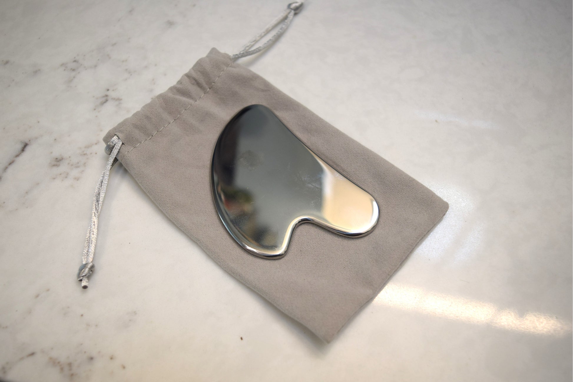 Stainless Steel Guasha on drawstring bag