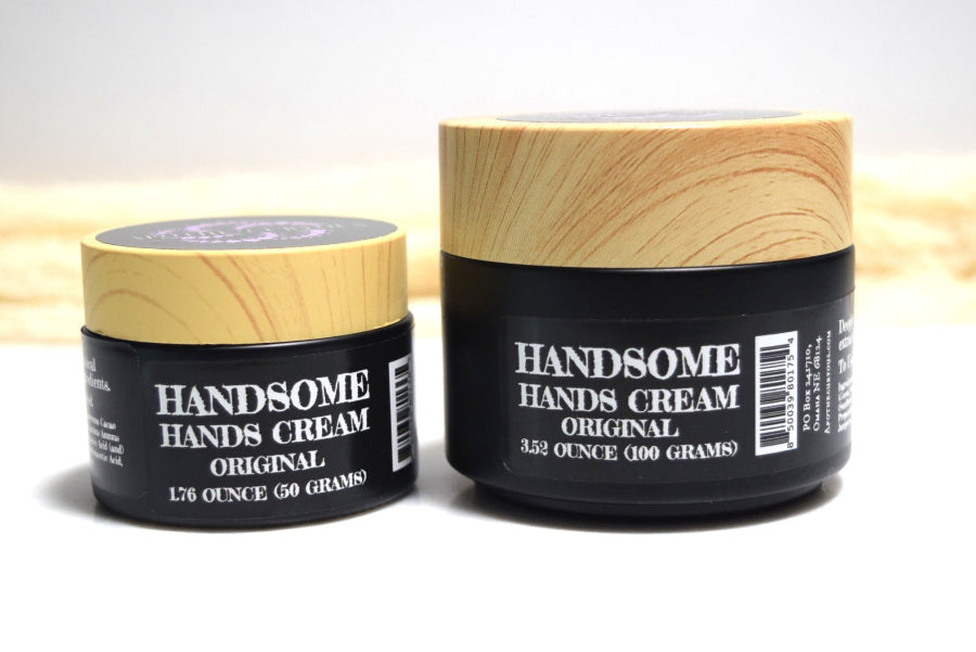 Two jars of Handsome Hands Cream on a light background