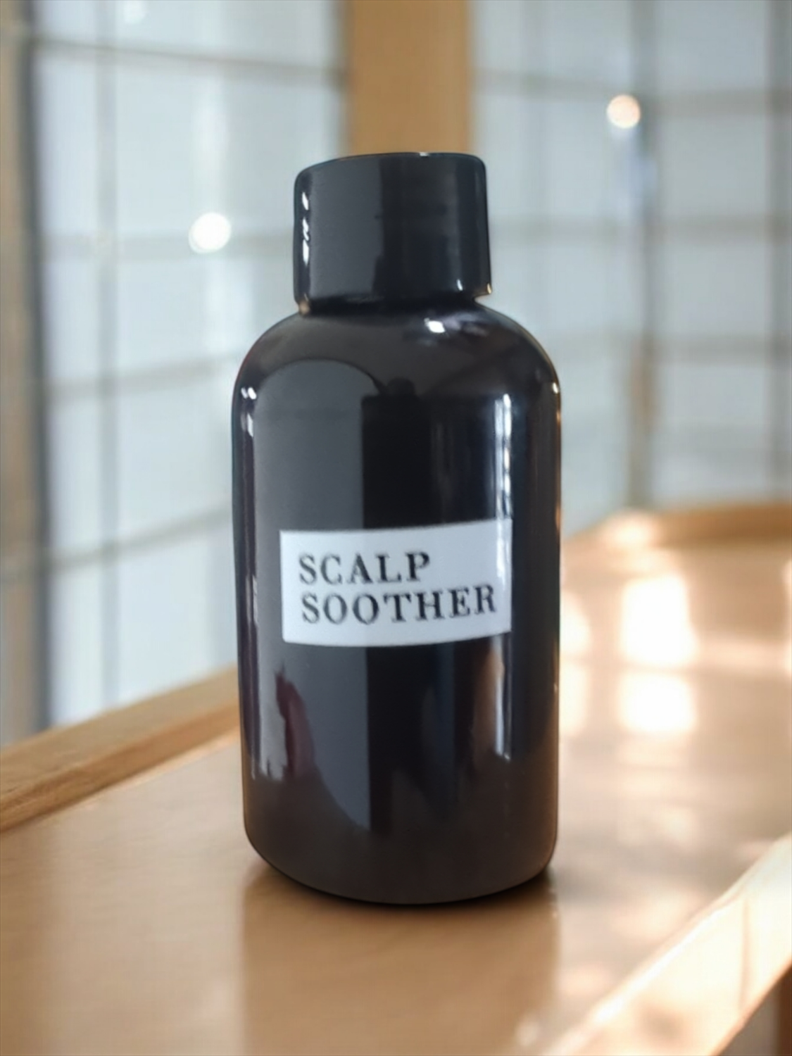 travel size bottle of ACV hair rinse, Apothecuryous