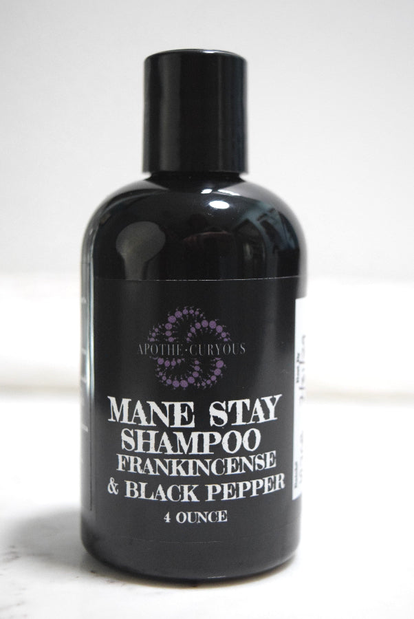 Black plastic bottle of Mane Stay shampoo, Apothecuryous