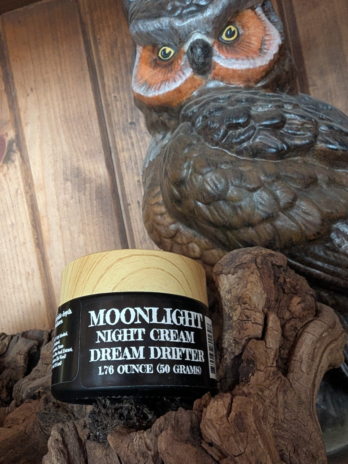 Moonlight Night cream in black glass jar with vintage owl in background, Apothecuryous
