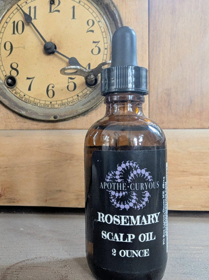 Rosemary Scalp oil with clock in background, Apothecuryous