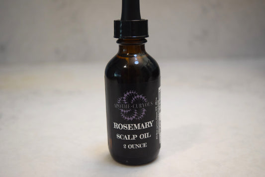 Rosemary scalp oil in amber glass bottle with dropper top, Apothecuryous