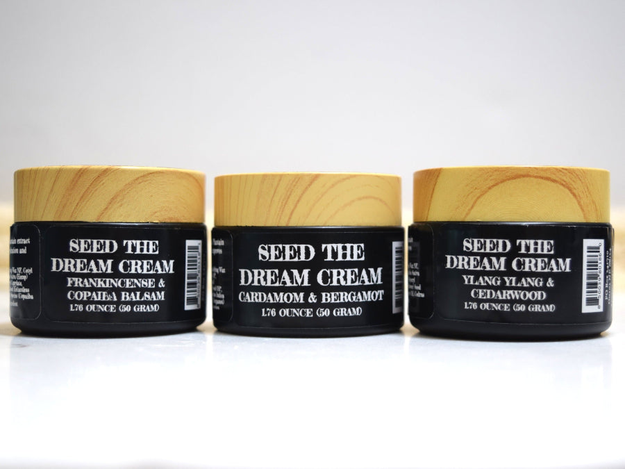 three scents of Seed the Dream cream in black glass jars, Apothecuryous