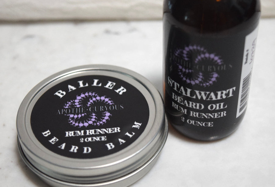Set of beard oil in amber glass bottle and beard balm in aluminum tin. matching Rum Runner scent, Apothecuryous