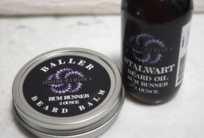 Set of beard oil in amber glass bottle and beard balm in aluminum tin. matching Rum Runner scent, Apothecuryous