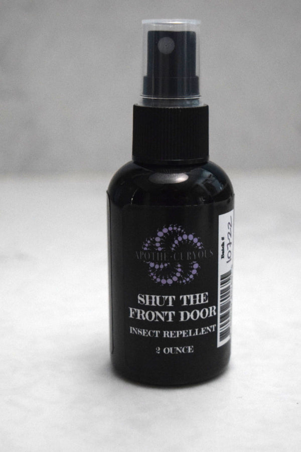 Natural essential oil insect repellent in black plastic bottle, Apothecuryous