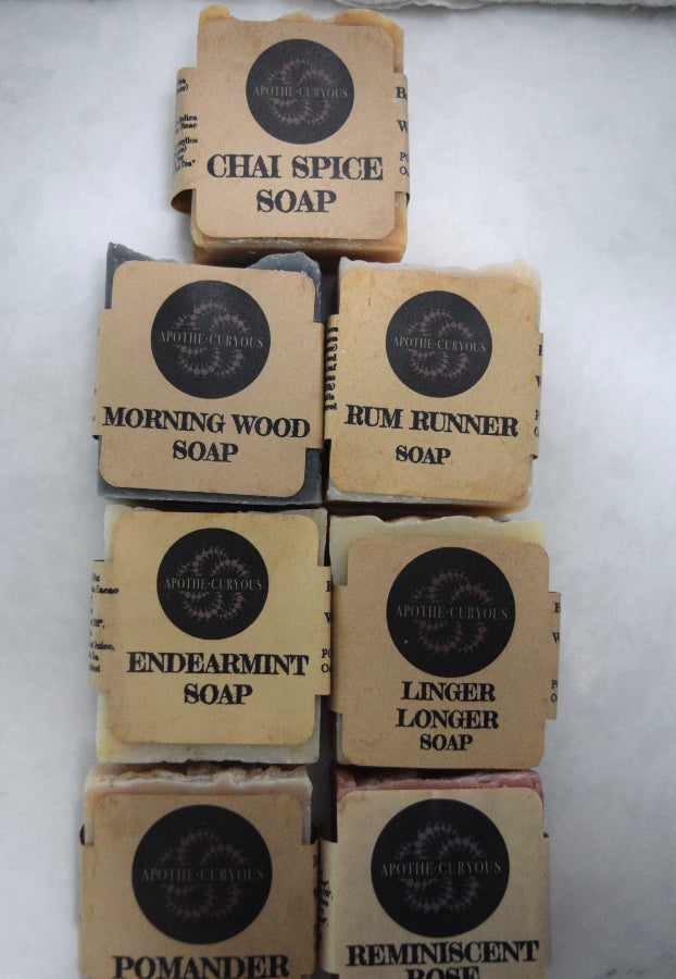 Assortment of cold process soaps in brown craft cigar band wrappers, Apothecuryous
