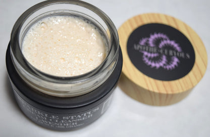 Sparkle Status cream cleanser with the lid off, showing rich creamy texture. Apothecuryous